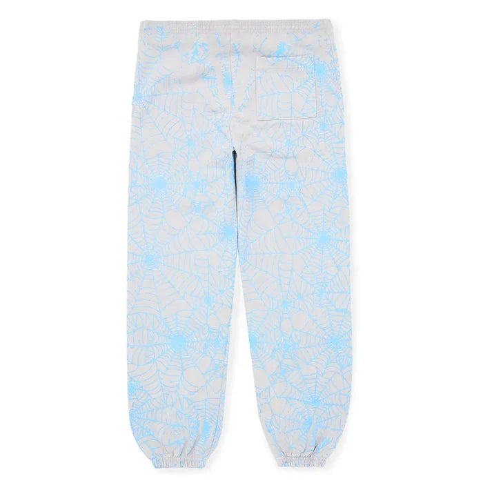 The 100% Cotton Sp5der Sweatpants for Men in light grey feature a relaxed fit, all-over spider web print, elasticated ankle cuffs, and back pockets. Shown laid flat with the back side facing up.