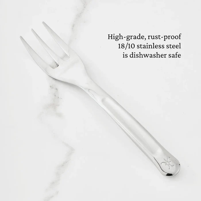 A 10.5-inch Stainless Steel Serving Fork from Hestan Provisions® rests on a white marble surface. Text beside it highlights that the fork is expertly crafted from high-grade, rust-proof 18/10 stainless steel and is dishwasher safe—making it an essential piece among the Hestan Provisions® Serving Tools and a must-have addition to any chef’s collection.