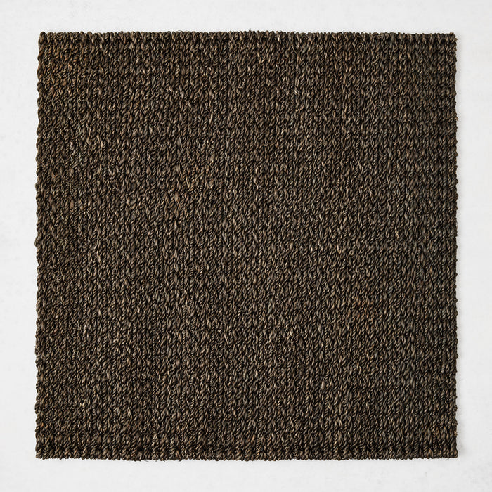 16-inch square chocolate brown abaca placemat with a textured, hand-woven design on a white background.