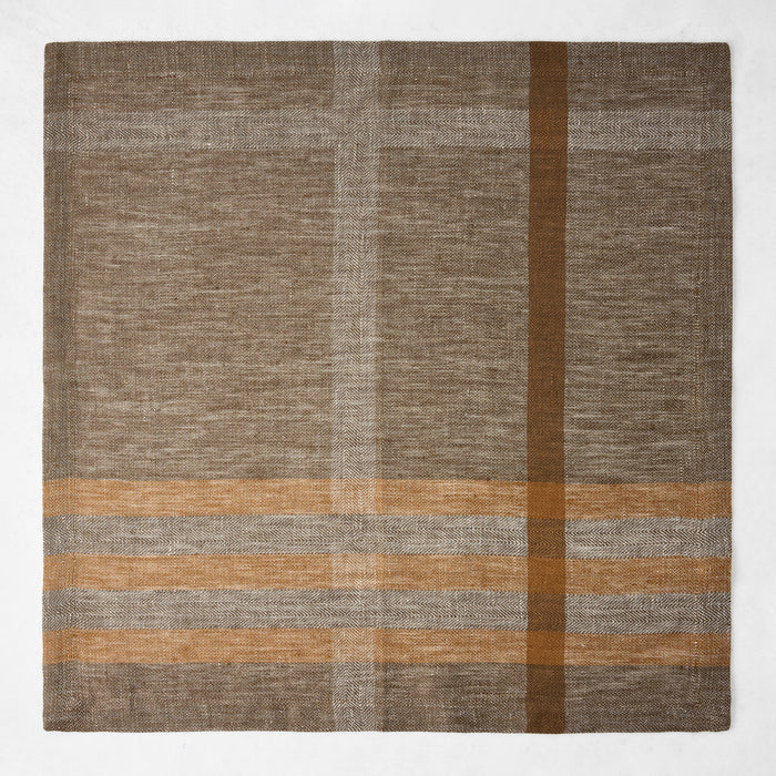 21-inch square chocolate brown linen napkin with a camel plaid pattern and textured herringbone weave.