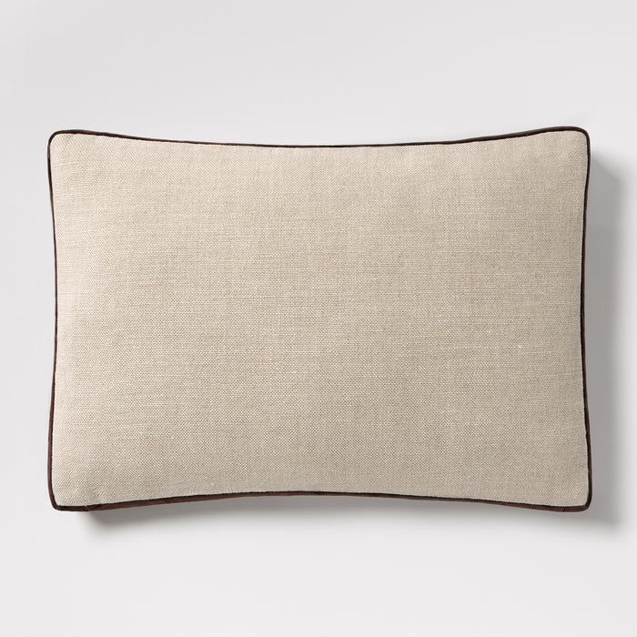 Dark brown velvet gusseted and linen lumbar pillow, 20"L x 14"H, with dark brown piping.