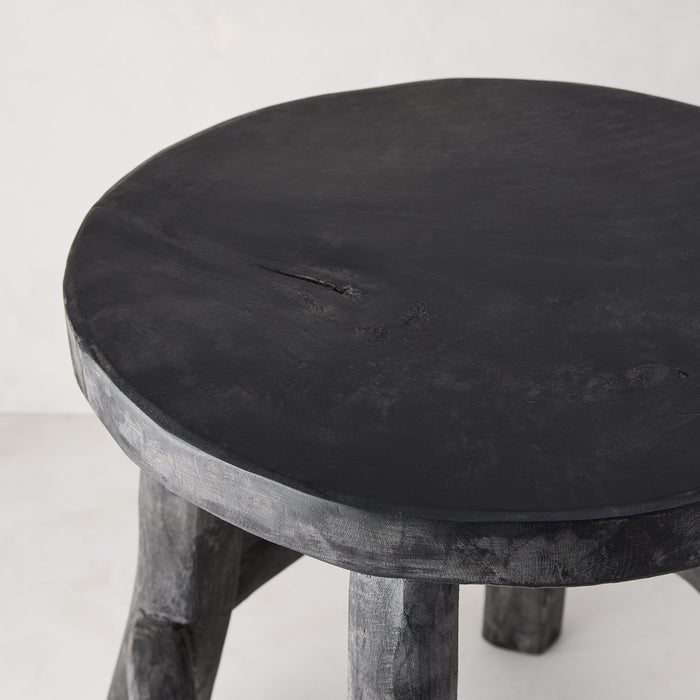 Diane Keaton + Hudson Grace black reclaimed teak wood stool with rustic texture.