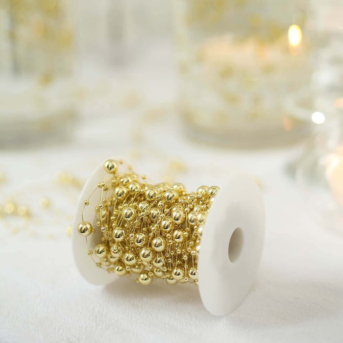 Gold bead garland on a spool for decorating and crafting