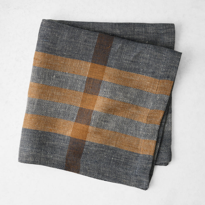 Graphite and brown plaid linen napkin with a herringbone weave, 21-inch square.