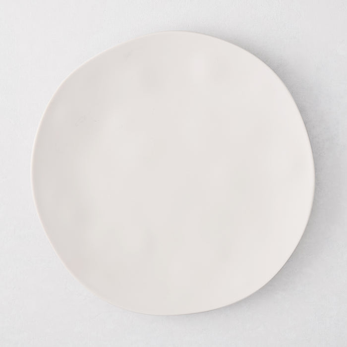 Laguna Melamine Appetizer Plate, off-white, 6.8"Dia, round, with subtle wavy edge.