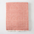 Mandarin orange Sutton Houndstooth throw blanket, 51"x67", cotton-acrylic blend, raw edge.