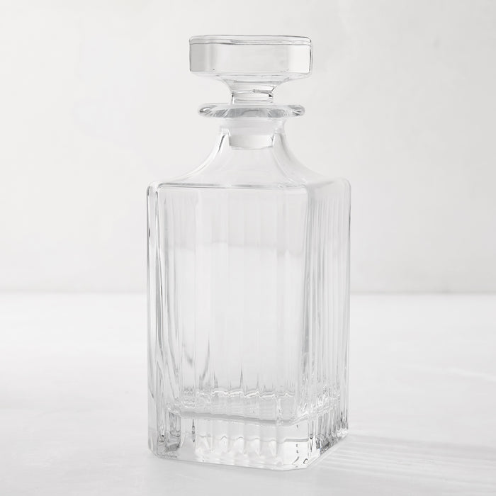 Regent 25oz clear eco-crystal decanter with etched vertical lines and a square stopper.