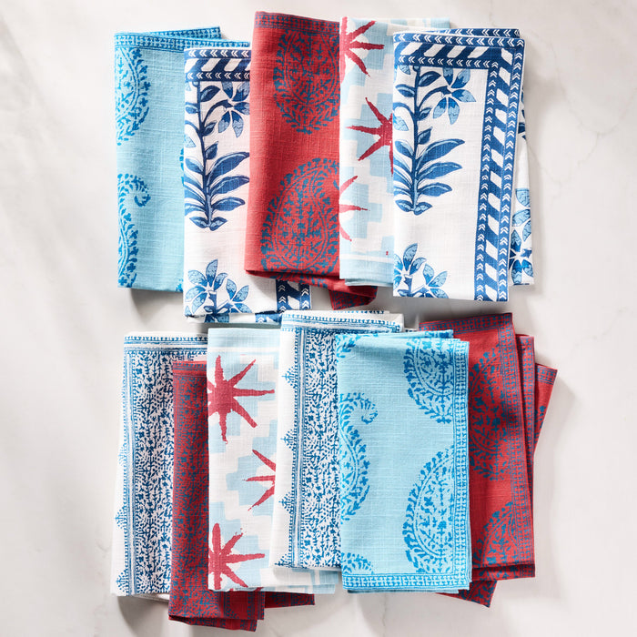 Peter Dunham + Hudson Grace Blue Shani Floral Printed Napkins, 100% cotton slub, with red and blue patterns.