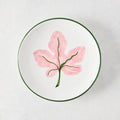 Peter Dunham + Hudson Grace hand-painted white appetizer plate with pink fig leaf and green border.