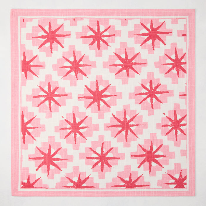 Peter Dunham + Hudson Grace Pink Starburst Printed Napkin, 100% cotton slub with red starburst pattern.