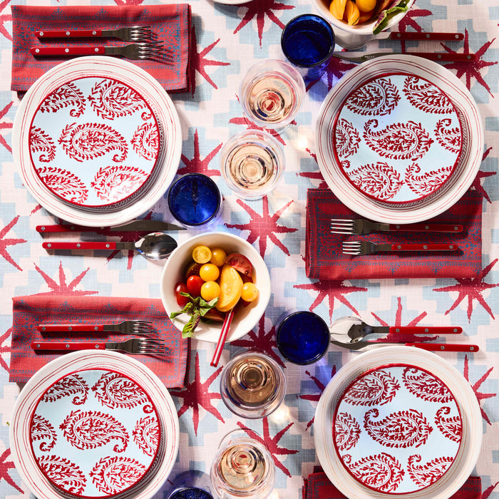 Peter Dunham + Hudson Grace Red Kashmir hand-painted paisley salad plates on a patterned table setting.
