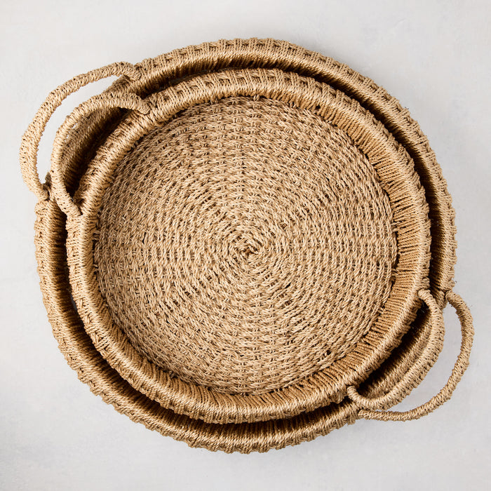 Small round woven abaca handled tray, natural brown, 16.5"Dia, with integrated handles.